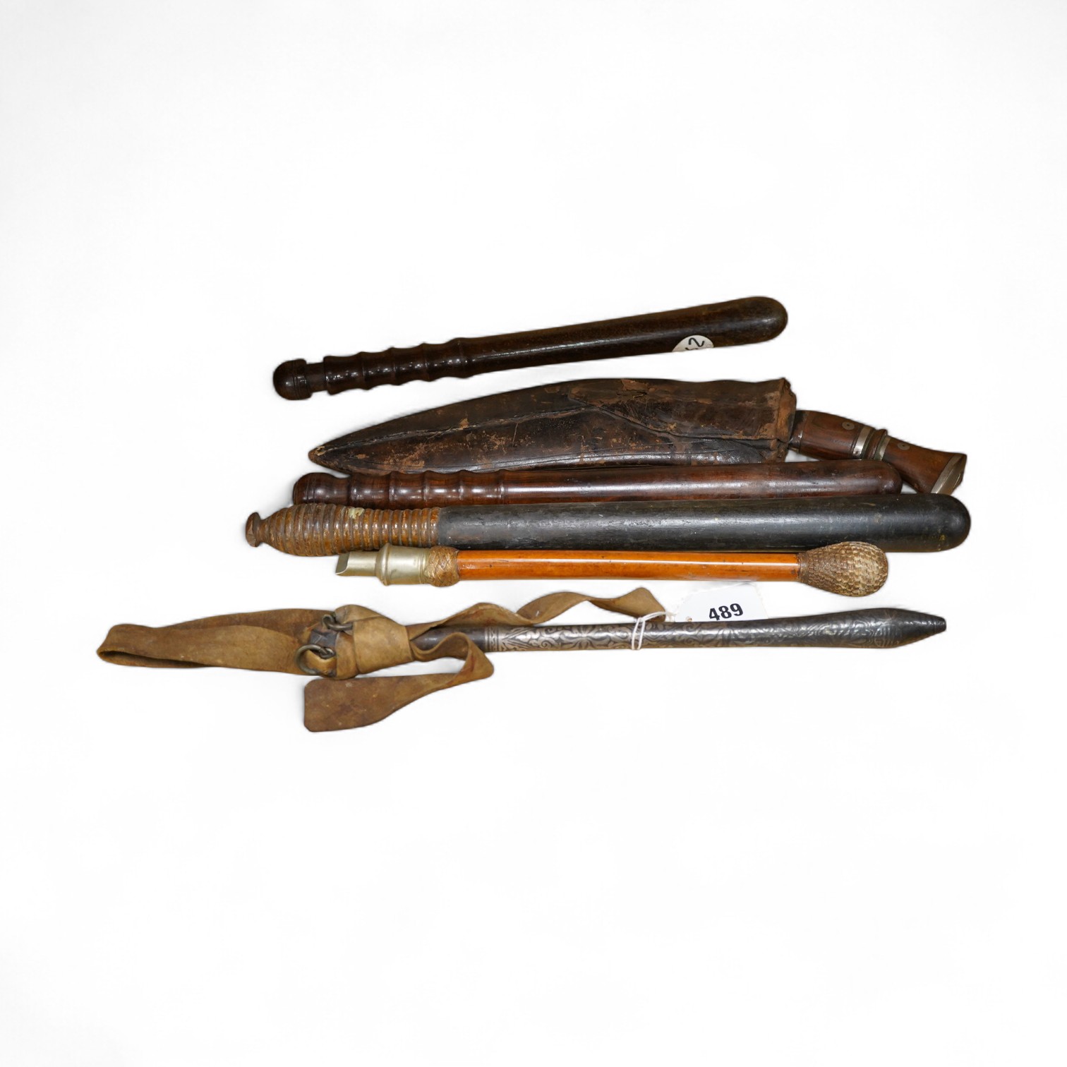 Three truncheons to include a Victorian painted example, a kukri, etc., painted truncheon 45cm